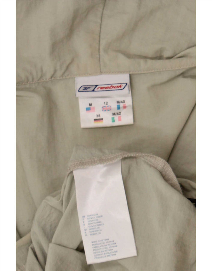 Reebok Chaqueta impermeable con capucha para mujer UK 12 Medium Beige Nylon