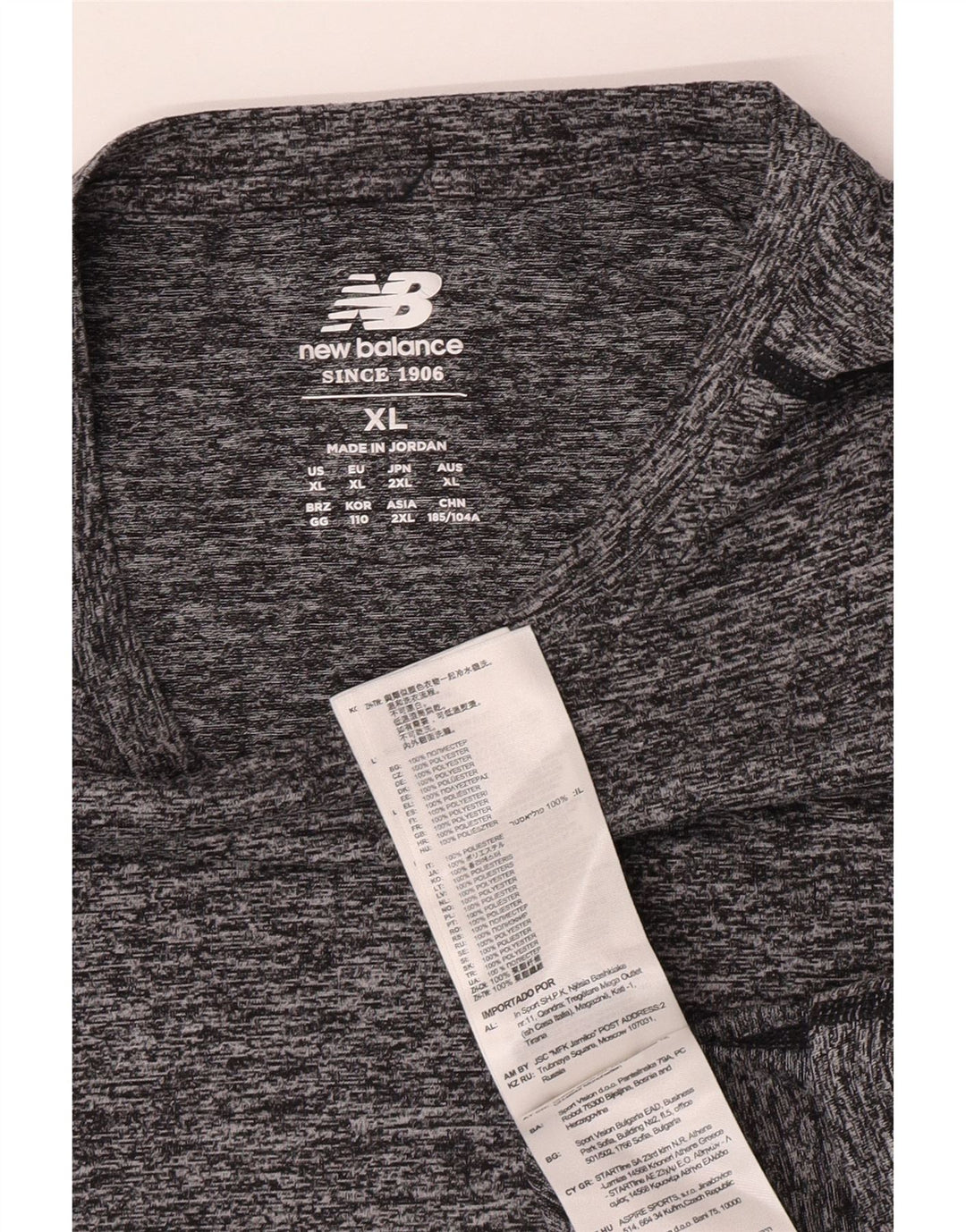 Camiseta New Balance Hombre Top XL Poliéster moteado gris