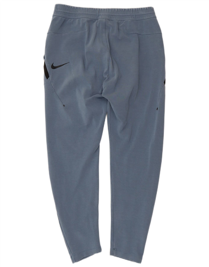 NIKE Hombre Pantalones de chándal de algodón color block en azul medio