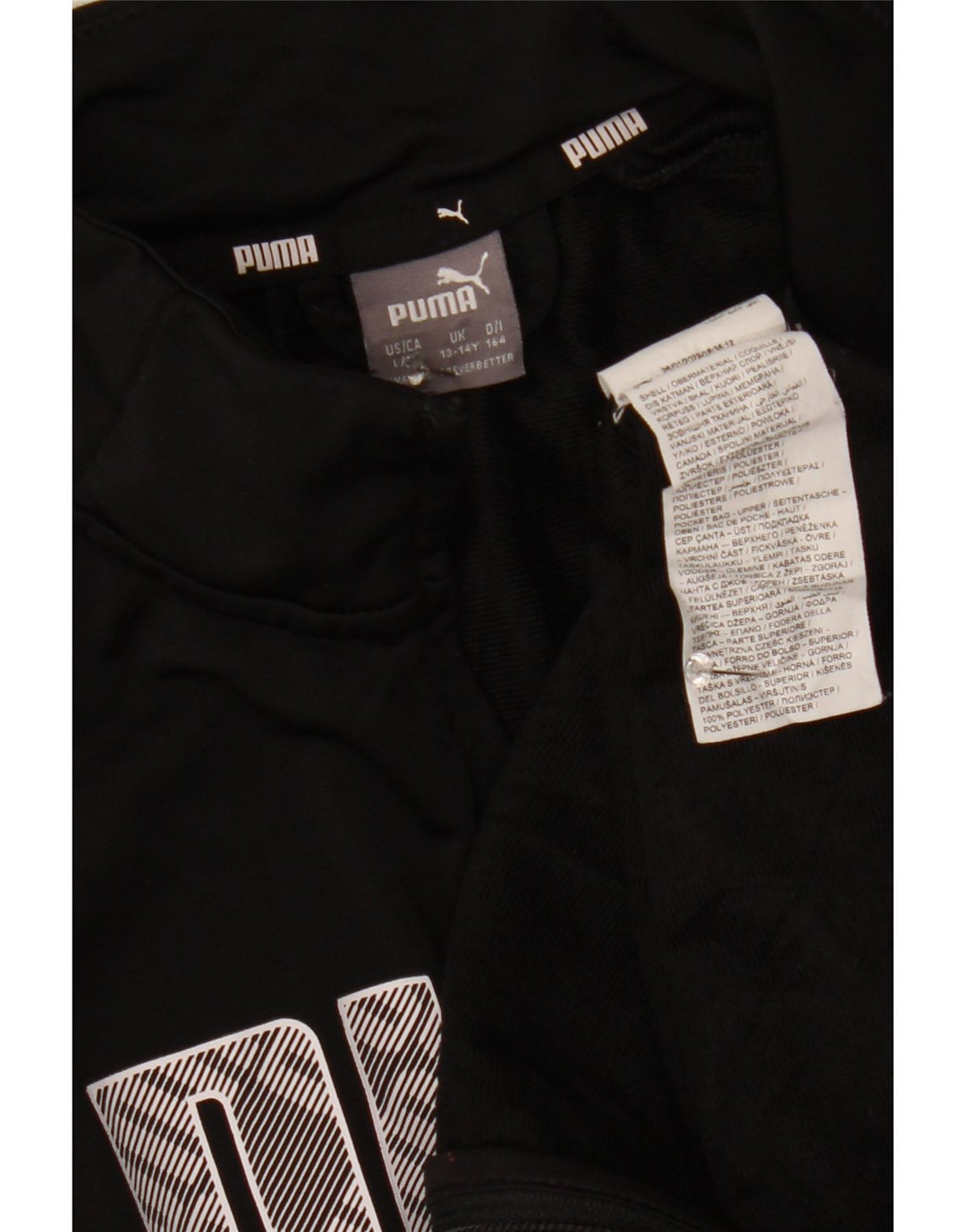 Puma Chaqueta de chándal gráfica para niños 13-14 años Negro Poliéster