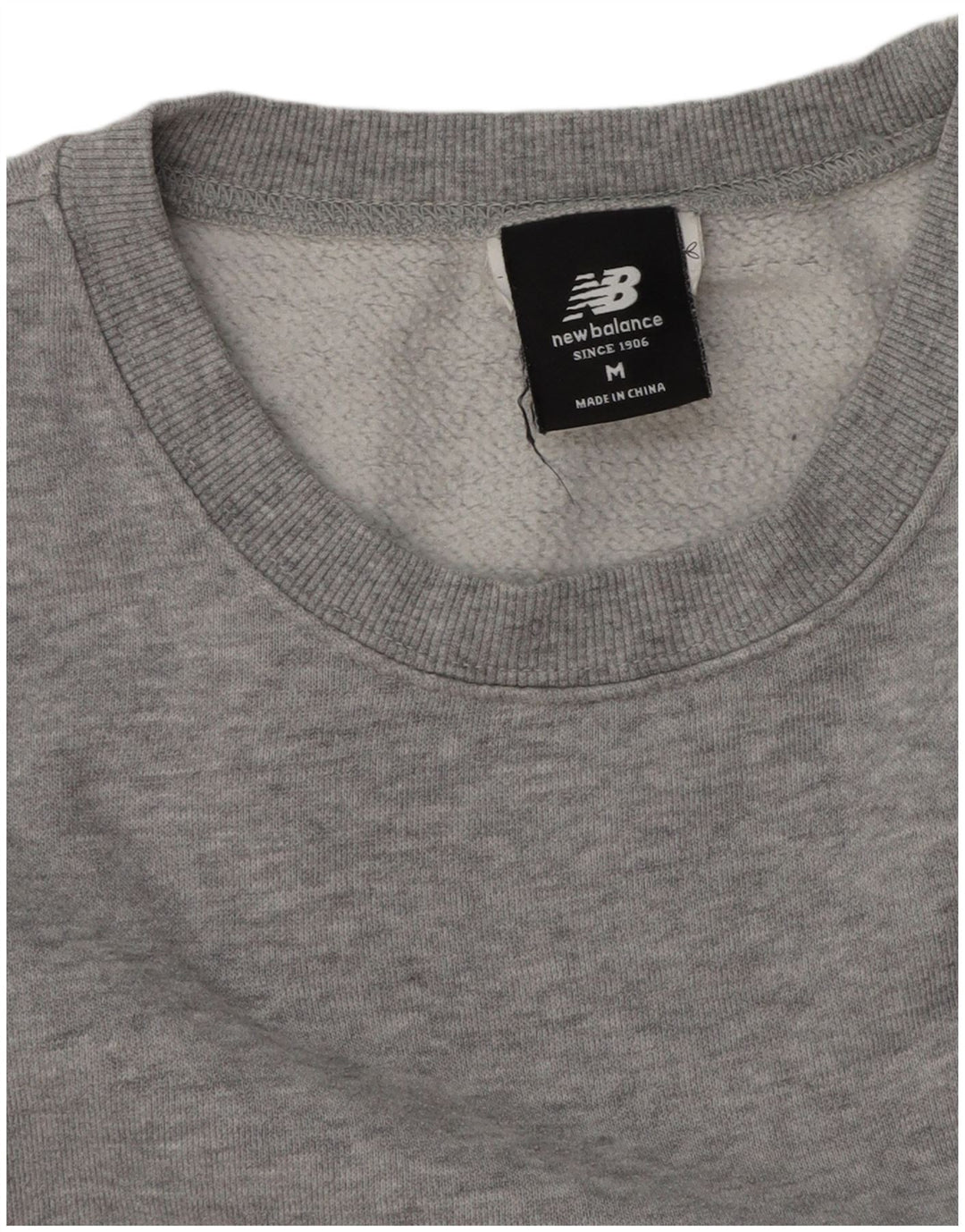 New Balance Hombre Sudadera Jumper Algodón Moteado Gris Medio