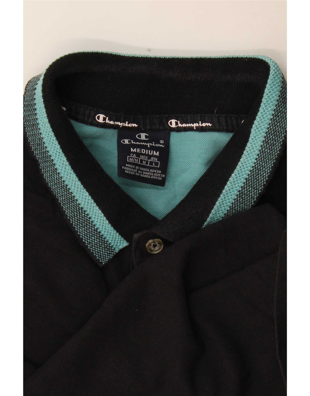 Champion Polo Hombre Rayas Negras Medianas