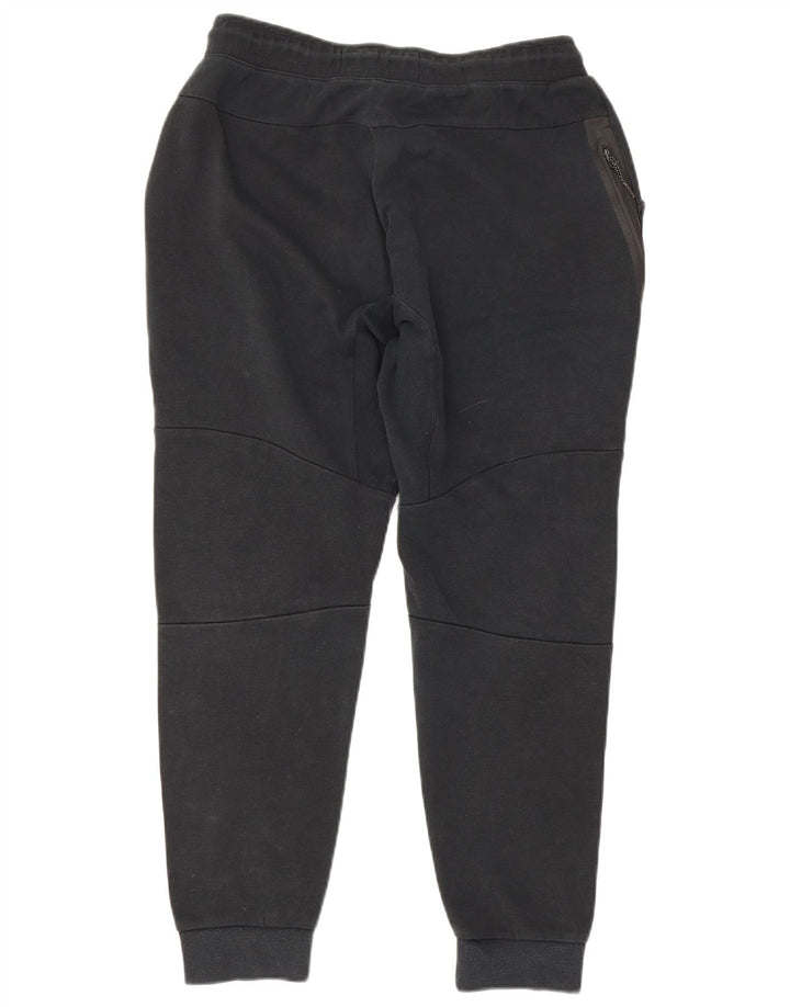 Nike - Pantalones de chándal para hombre, talla grande, color negro, algodón