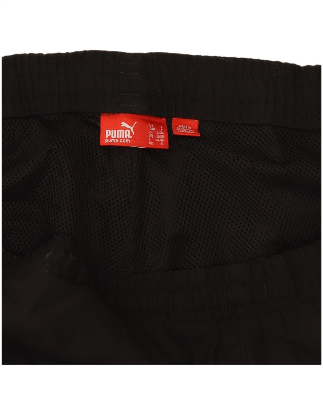 PUMA Pantalones de chándal con estampado gráfico para hombre, talla pequeña, negro
