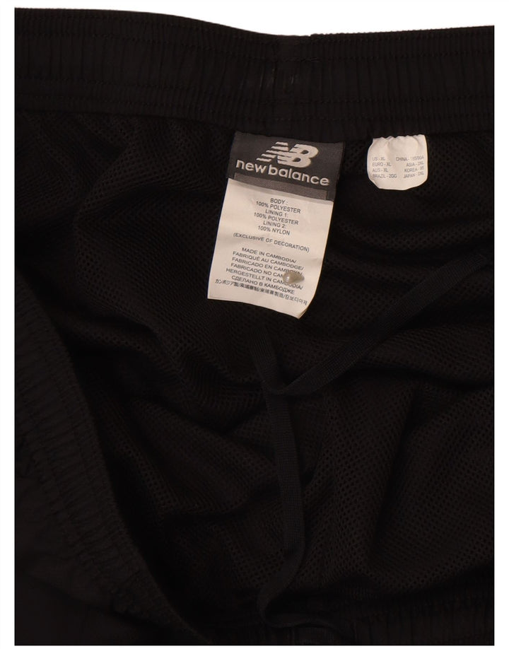 NEW BALANCE Pantalón de chándal gráfico para hombre XL Poliéster negro