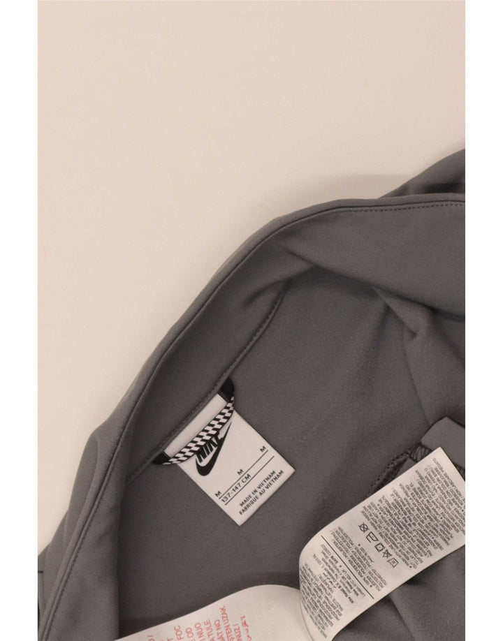 Nike - Chaqueta de chándal con gráfico para niños, 10-11 años, color gris medio
