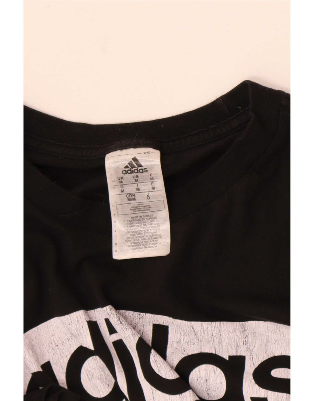 Adidas Camiseta gráfica de tres rayas para hombre Top mediano de algodón negro