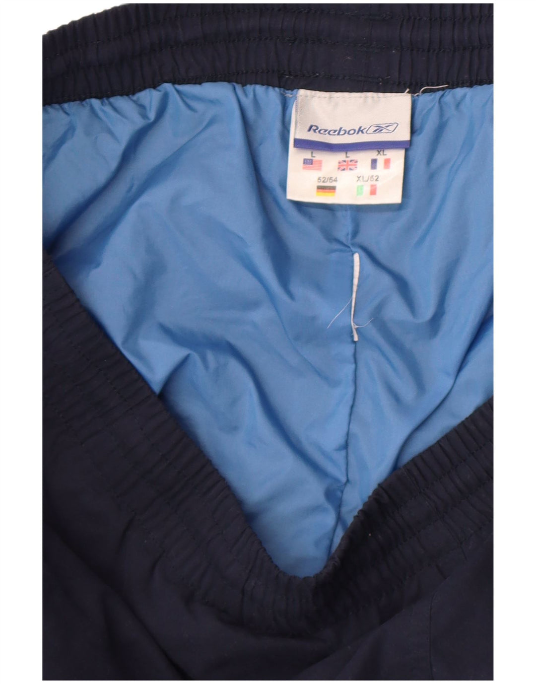 Reebok - Pantalón de chándal para hombre, color azul marino
