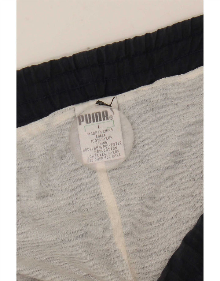 Puma - Pantalón de chándal para hombre, talla grande, nailon azul marino