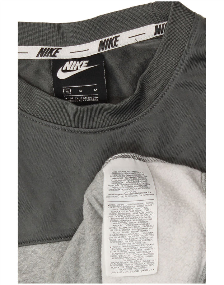 Nike Hombre Sudadera con gráfico tipo jersey de algodón color block en gris medio