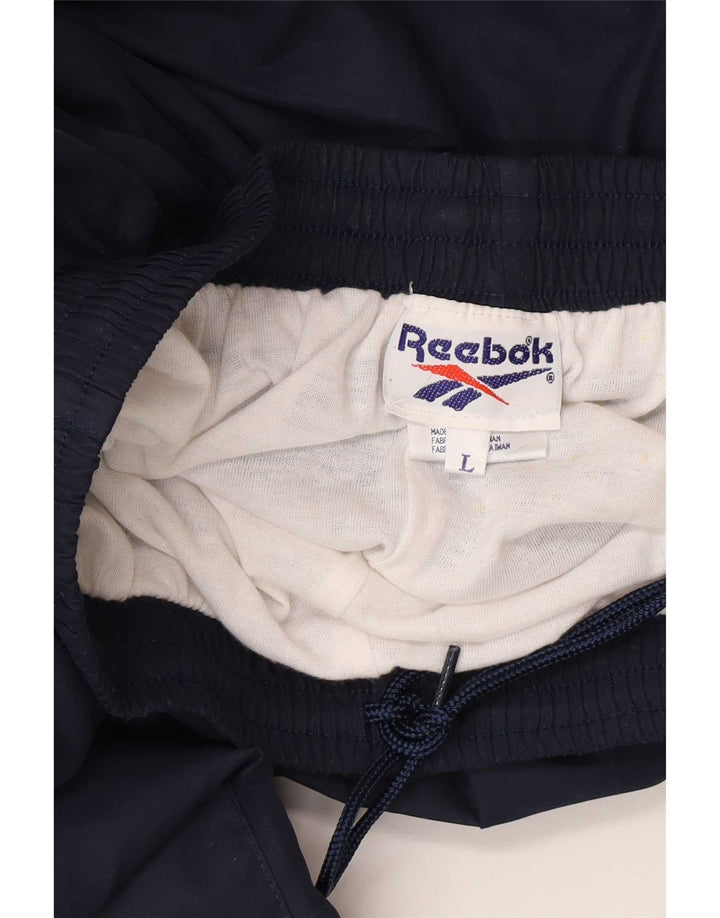Reebok - Pantalón de chándal para hombre, color azul marino, poliéster