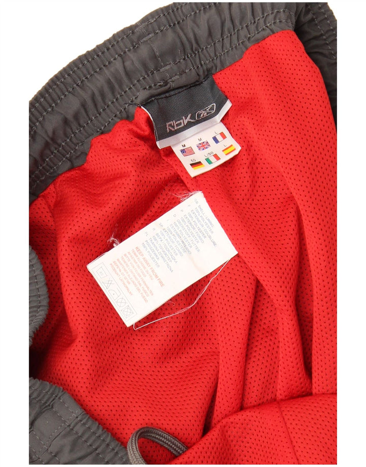 Pantalón de Chándal REEBOK Hombre Gris Medio Poliéster