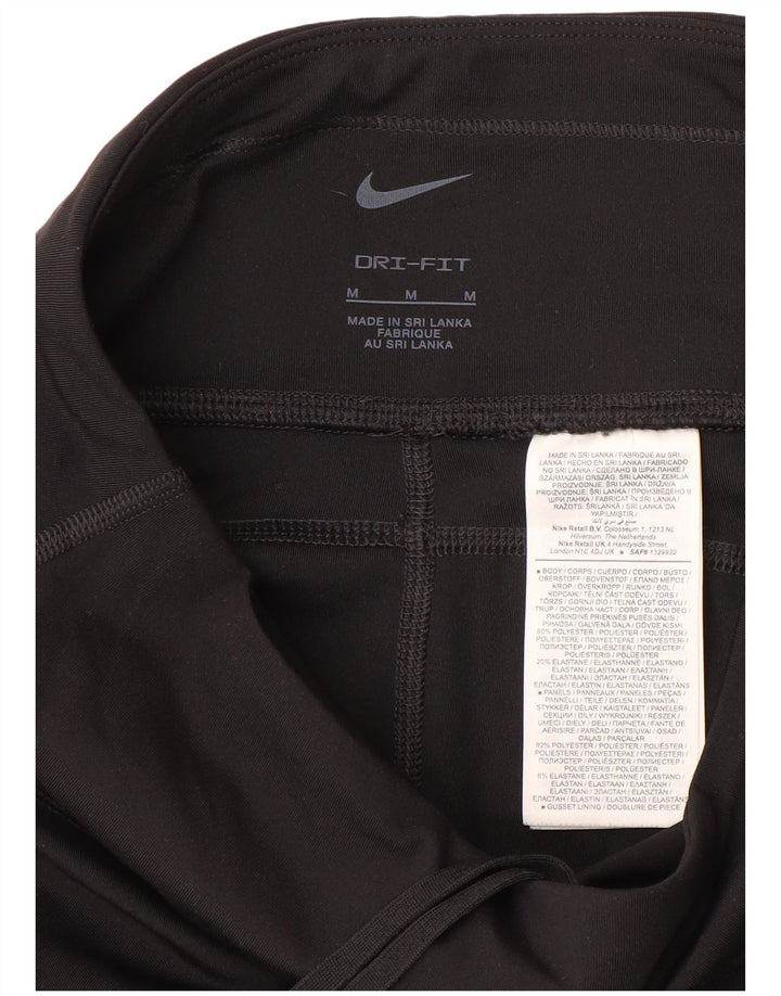Nike - Leggings capri Dri Fit para mujer, talla 40, poliéster negro mediano