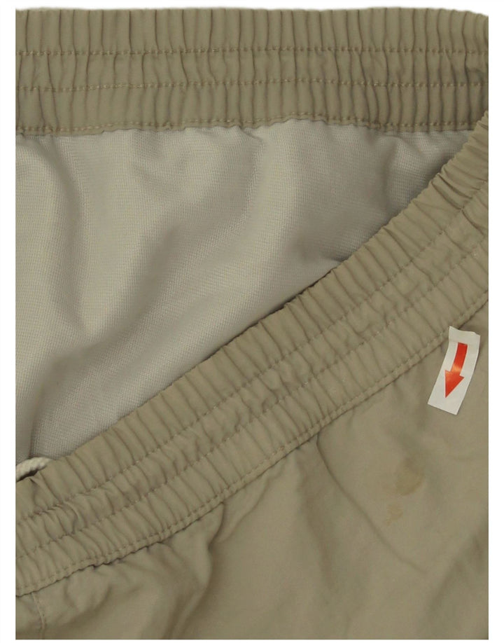 Fila Shorts deportivos gráficos con bloques de color verde medio para hombre