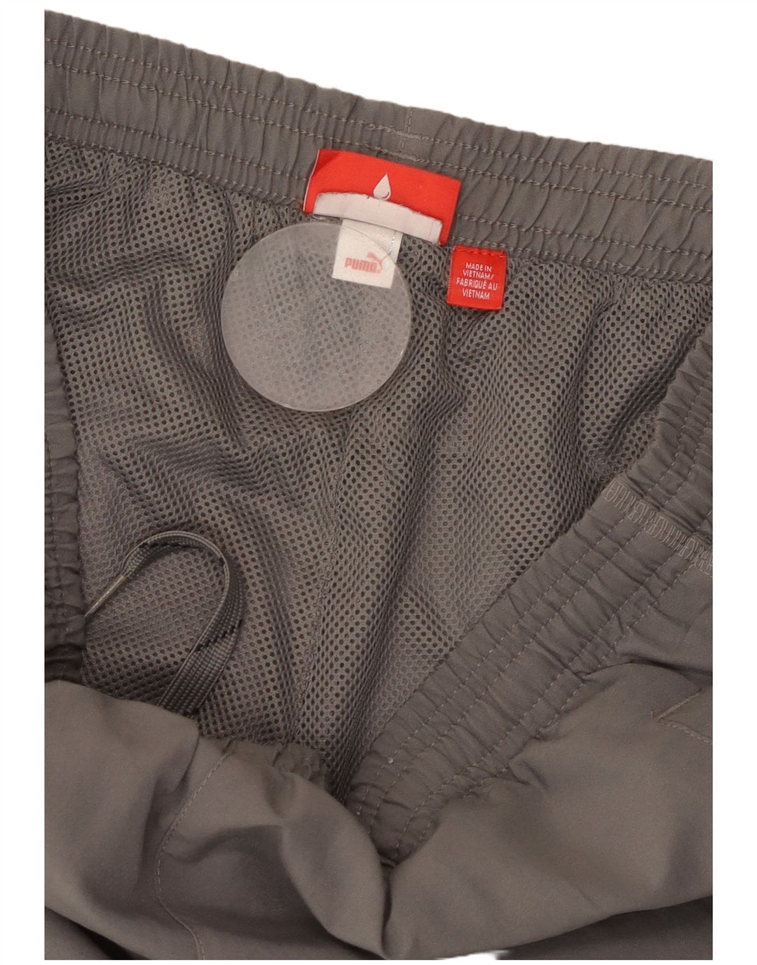 PUMA Pantalones de chándal con estampado gráfico para hombre Joggers Small Grey