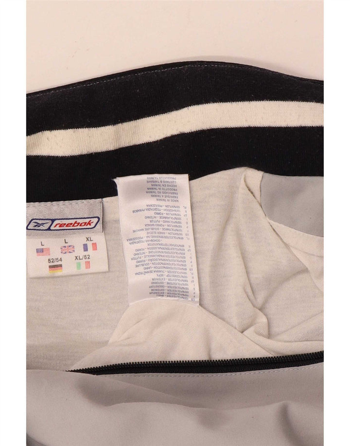 Reebok - Chaqueta de chándal con gráfico para hombre, poliéster color block, color gris grande