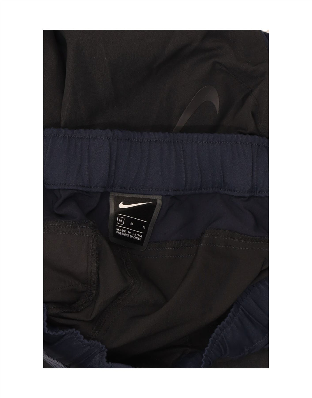 NIKE Pantalón cargo cónico para hombre mediano W32 L27 negro color block