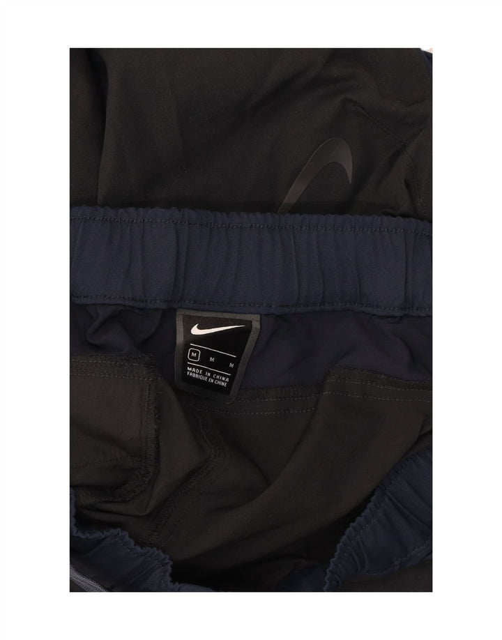 NIKE Pantalón cargo cónico para hombre mediano W32 L27 negro color block