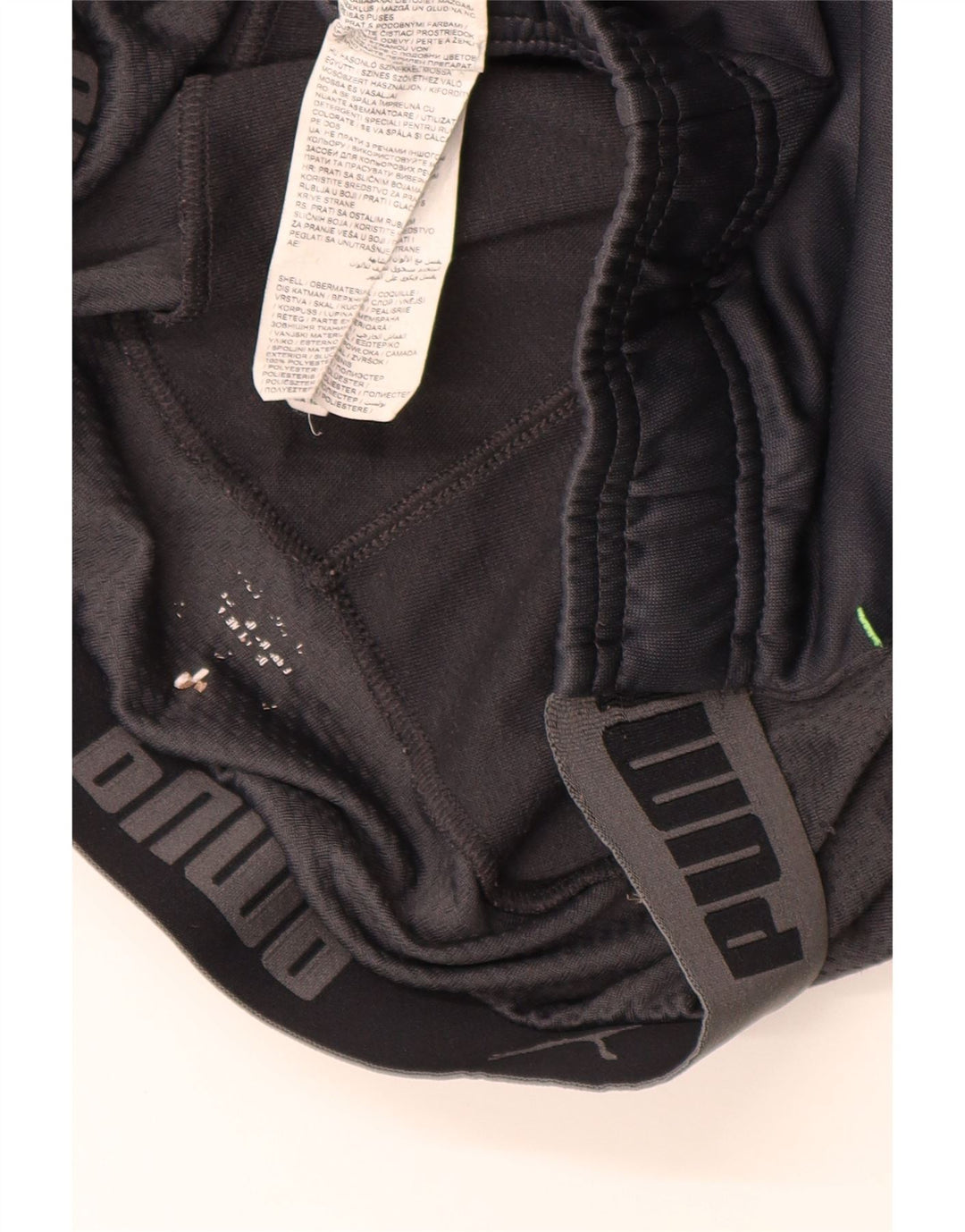 Puma Pantalones de chándal con estampado gráfico para niños 13-14 años Negro Colorblock