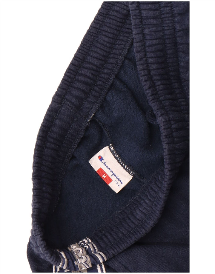 Champion Pantalones De Chándal Gráficos En Azul Marino Medio Colorblock