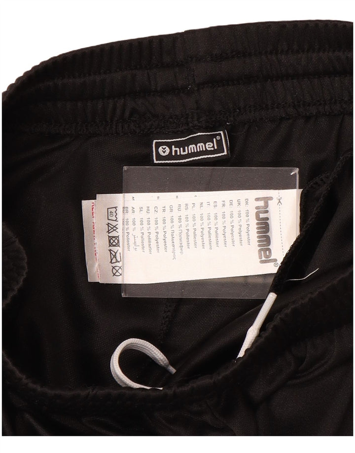 HUMMEL Pantalones de chándal con estampado gráfico para niño 14-15 años Negro Poliéster