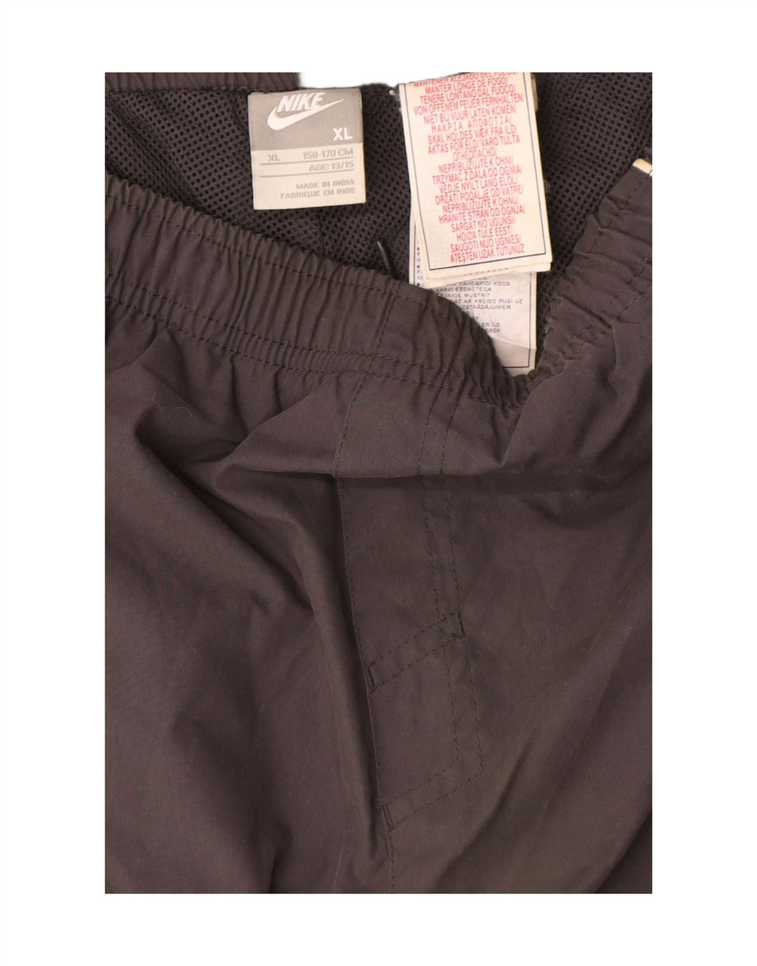 Nike Pantalones impermeables para niños 13-14 años XL Gris Colorblock Poliéster