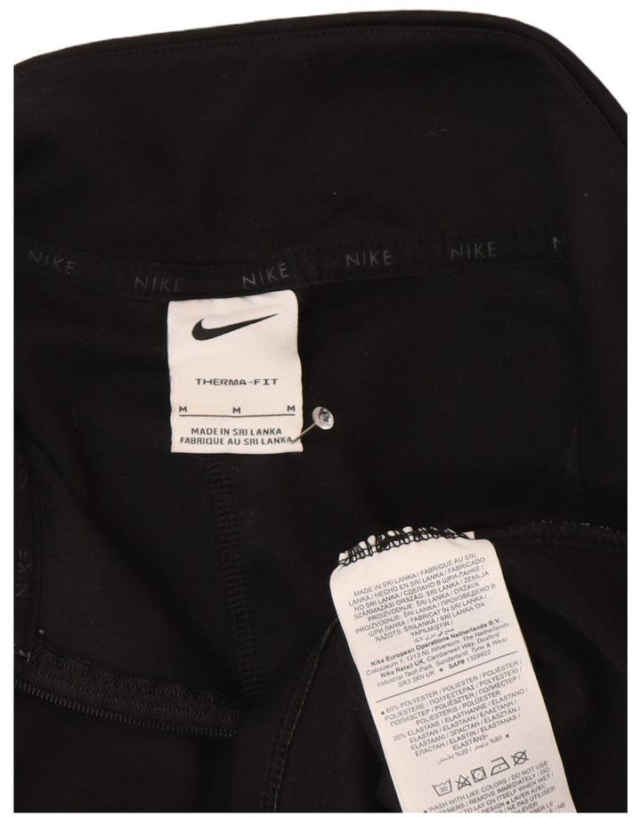 Nike - Chándal Therma-Fit con cremallera y cuello para mujer, talla M, color negro
