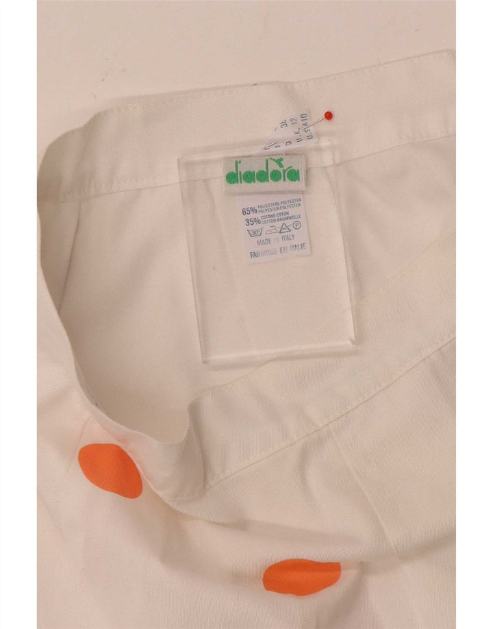 Minifalda Diadora para mujer UK 12 Medium W26 Poliéster de lunares blancos