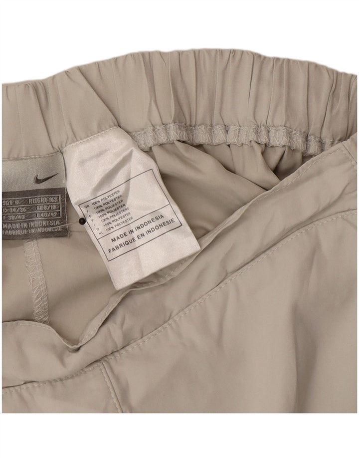 Nike - Pantalones cortos deportivos para mujer, talla 8/10, poliéster gris pequeño