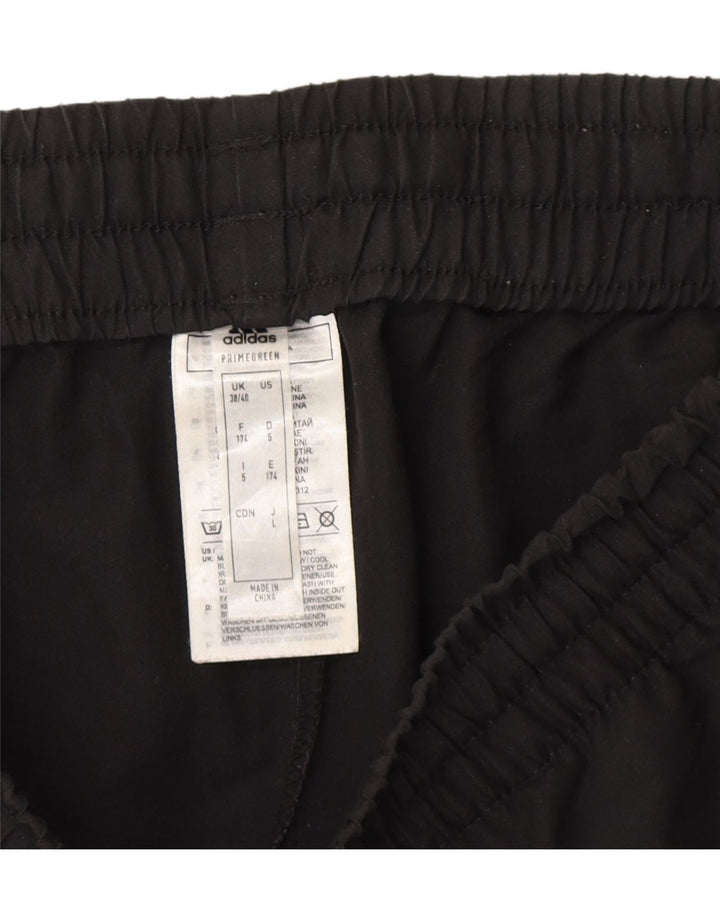 ADIDAS Mens Tracksuit Trousers UK 38/40 Medium  Black Polyester Vintage Adidas and Second-Hand Adidas from Messina Hembry 