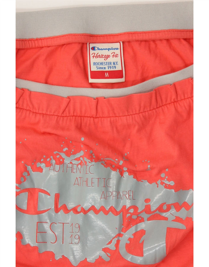 Champion Mono Corto con Hombros Descubiertos y Gráfico para Mujer UK 40 Mediano Naranja
