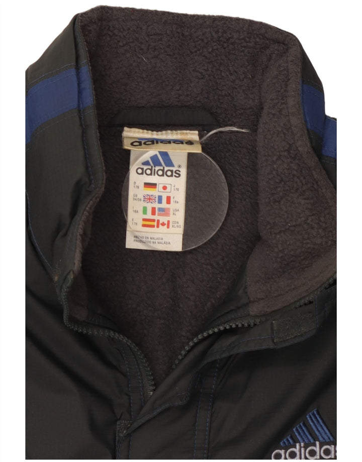 Adidas Chaqueta cortavientos para niño 15-16 años Negro Colorblock Poliéster