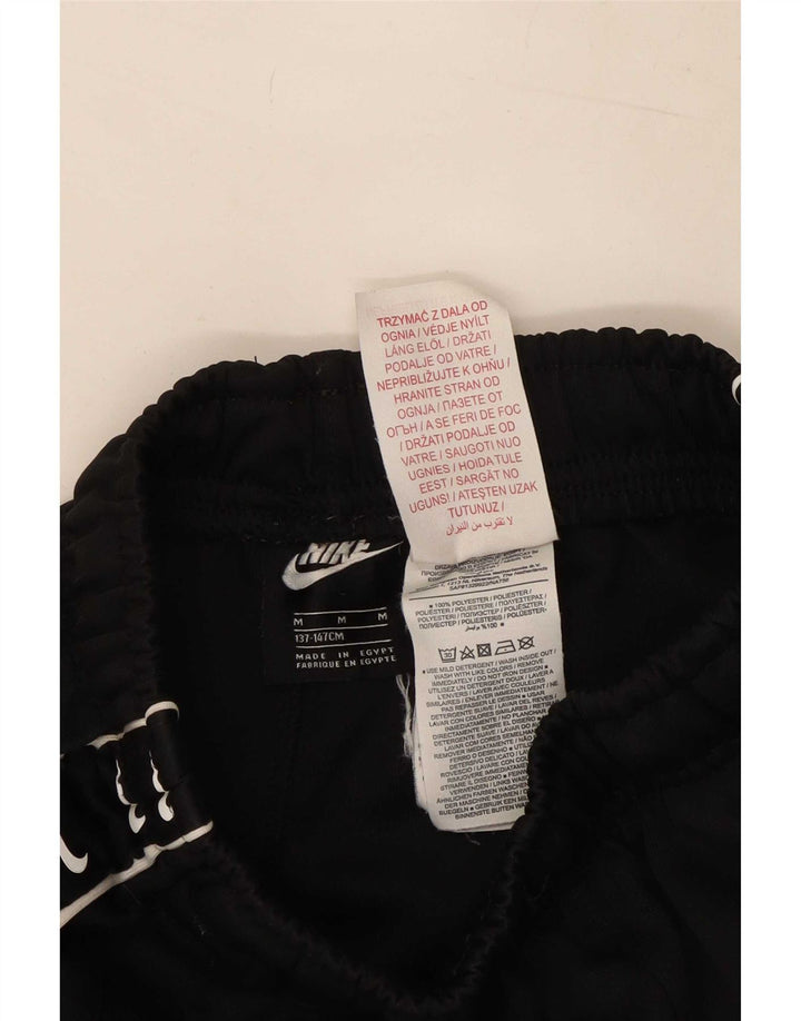 Nike Pantalones cortos deportivos con gráficos para niños 10-11 años Mediano Negro Poliéster