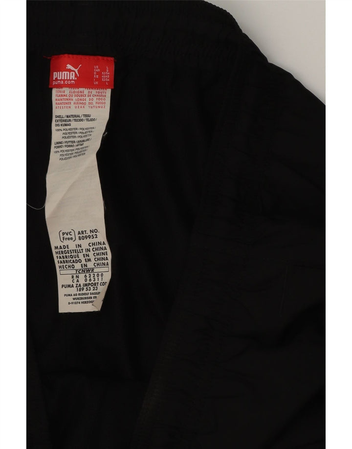 PUMA Pantalones de chándal capri para hombre, poliéster negro grande