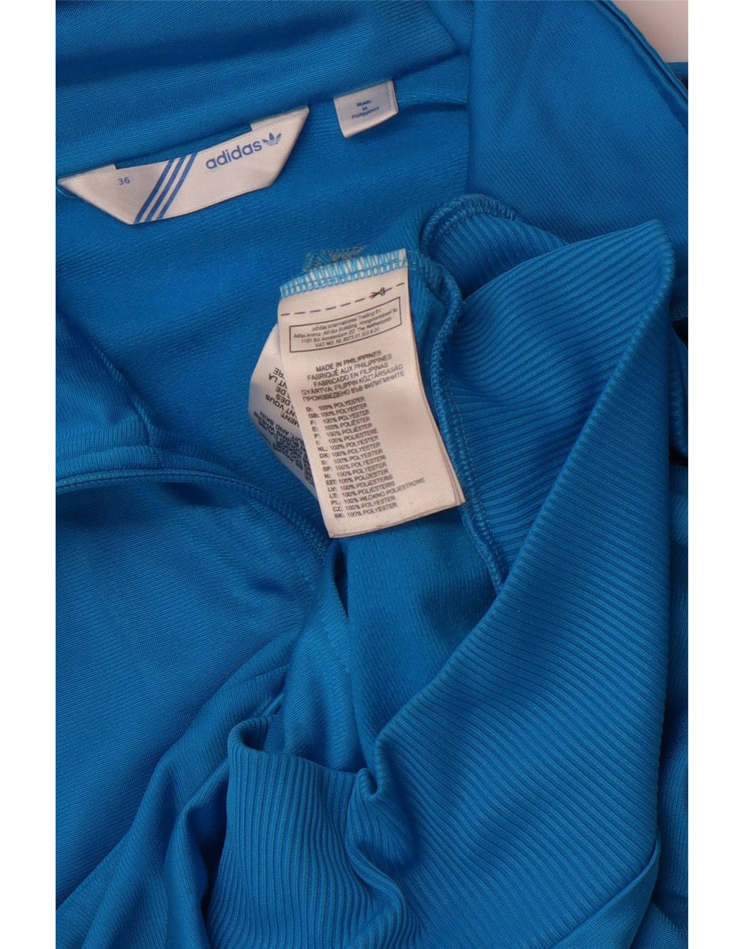 Adidas - Chaqueta de chándal gráfica para mujer, talla 36, poliéster azul pequeño