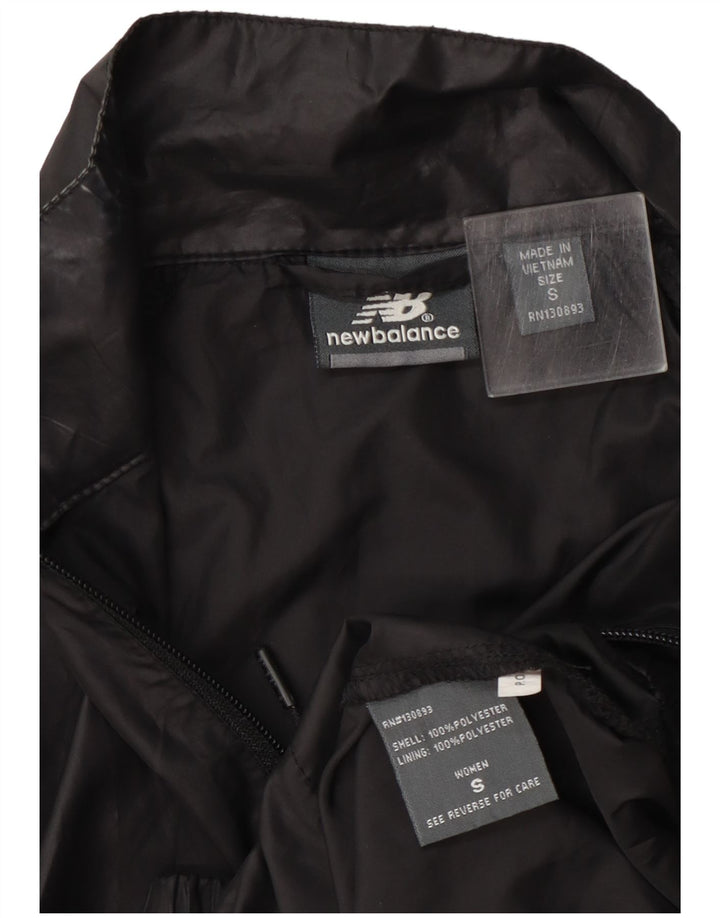 New Balance Chaqueta de chándal gráfica para mujer UK 8 Small Poliéster negro