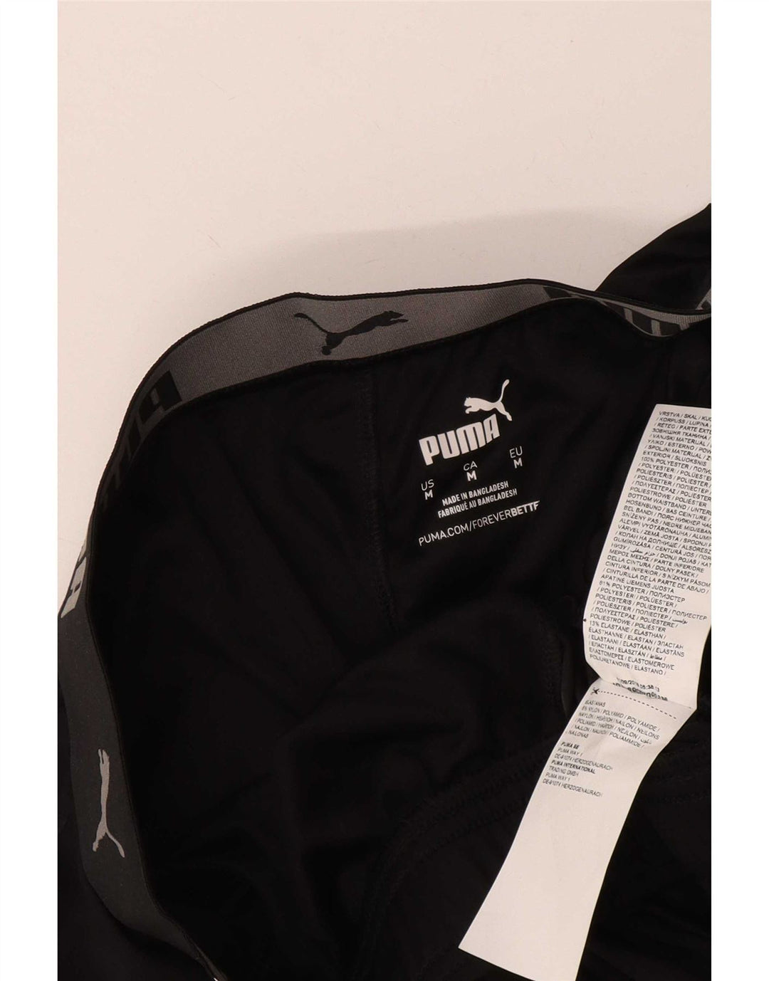 Puma Pantalones cortos deportivos gráficos para hombre Poliéster negro mediano
