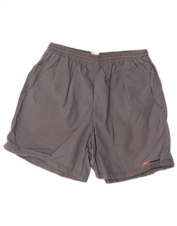Pantalones cortos deportivos Reebok Hombre Nylon gris medio