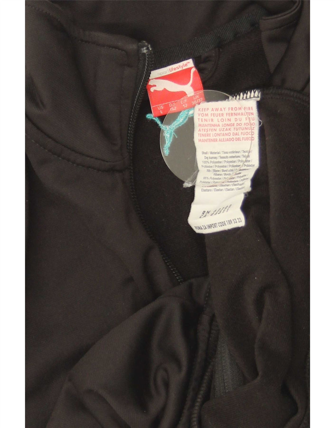 Puma Chaqueta de chándal gráfica para niños 11-12 años Negro Poliéster