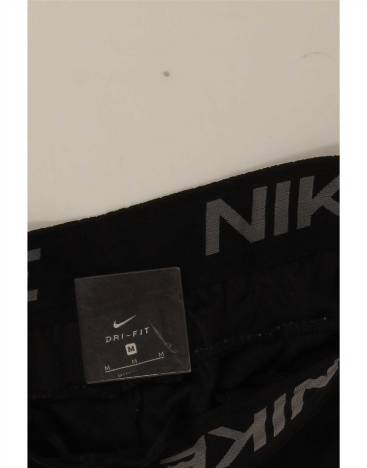Pantalones cortos deportivos Nike Dri Fit para hombre en color negro mediano