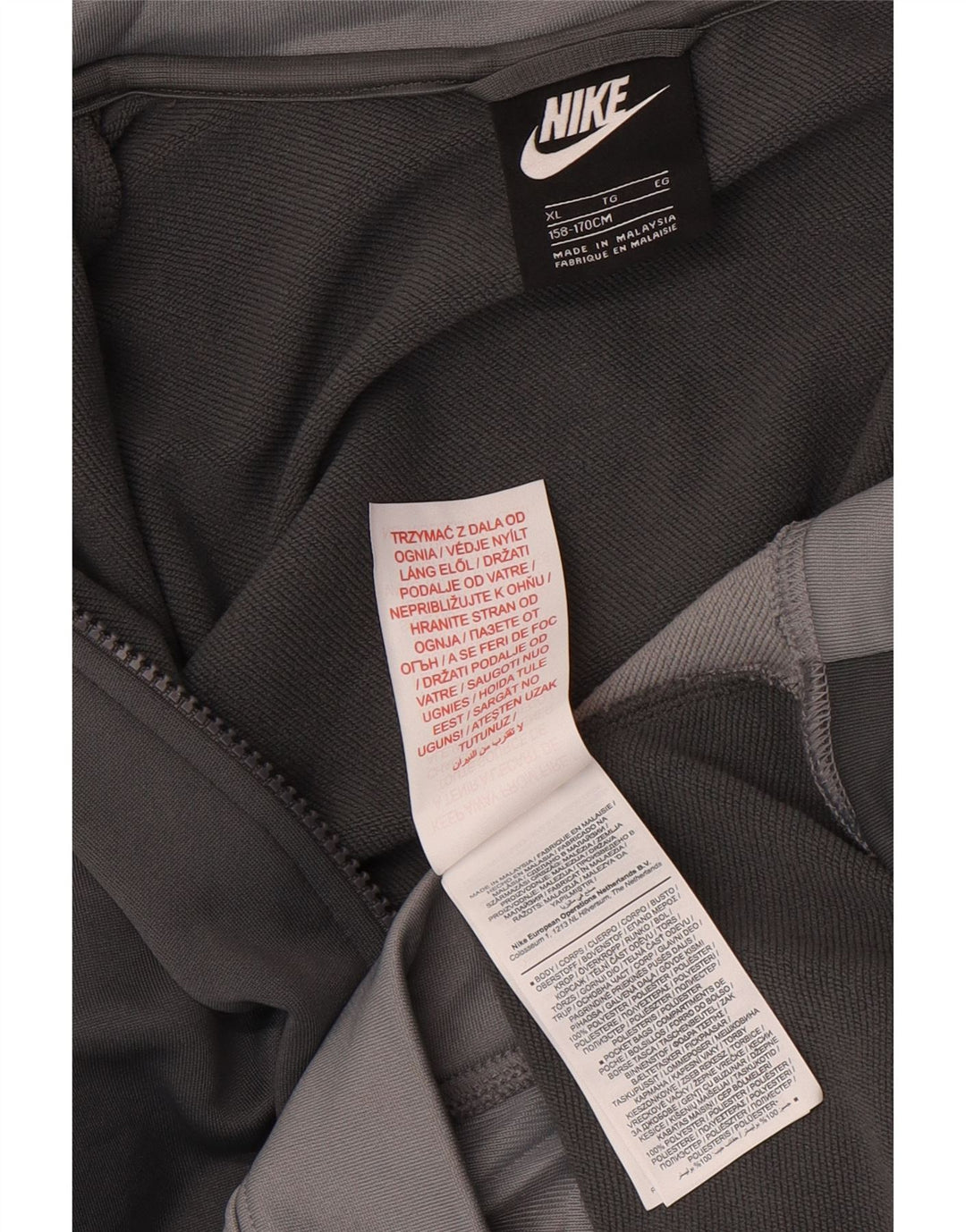 Nike Chaqueta de chándal para niños 13-14 años XL Gris Colorblock Poliéster