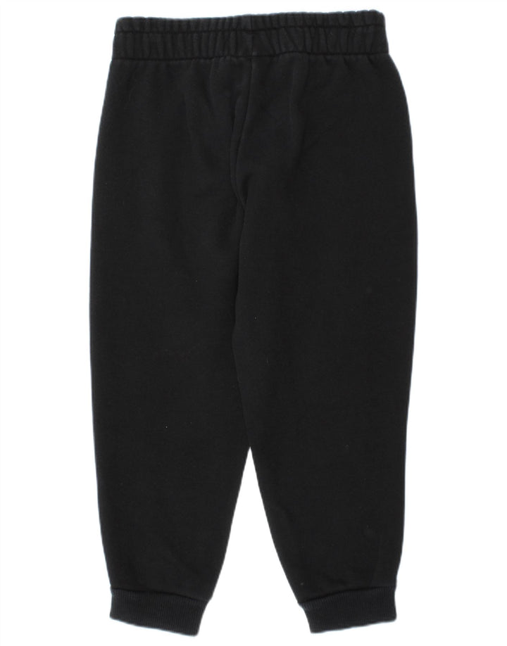 Puma Pantalones de chándal con estampado gráfico para niños, 4-5 años, algodón negro