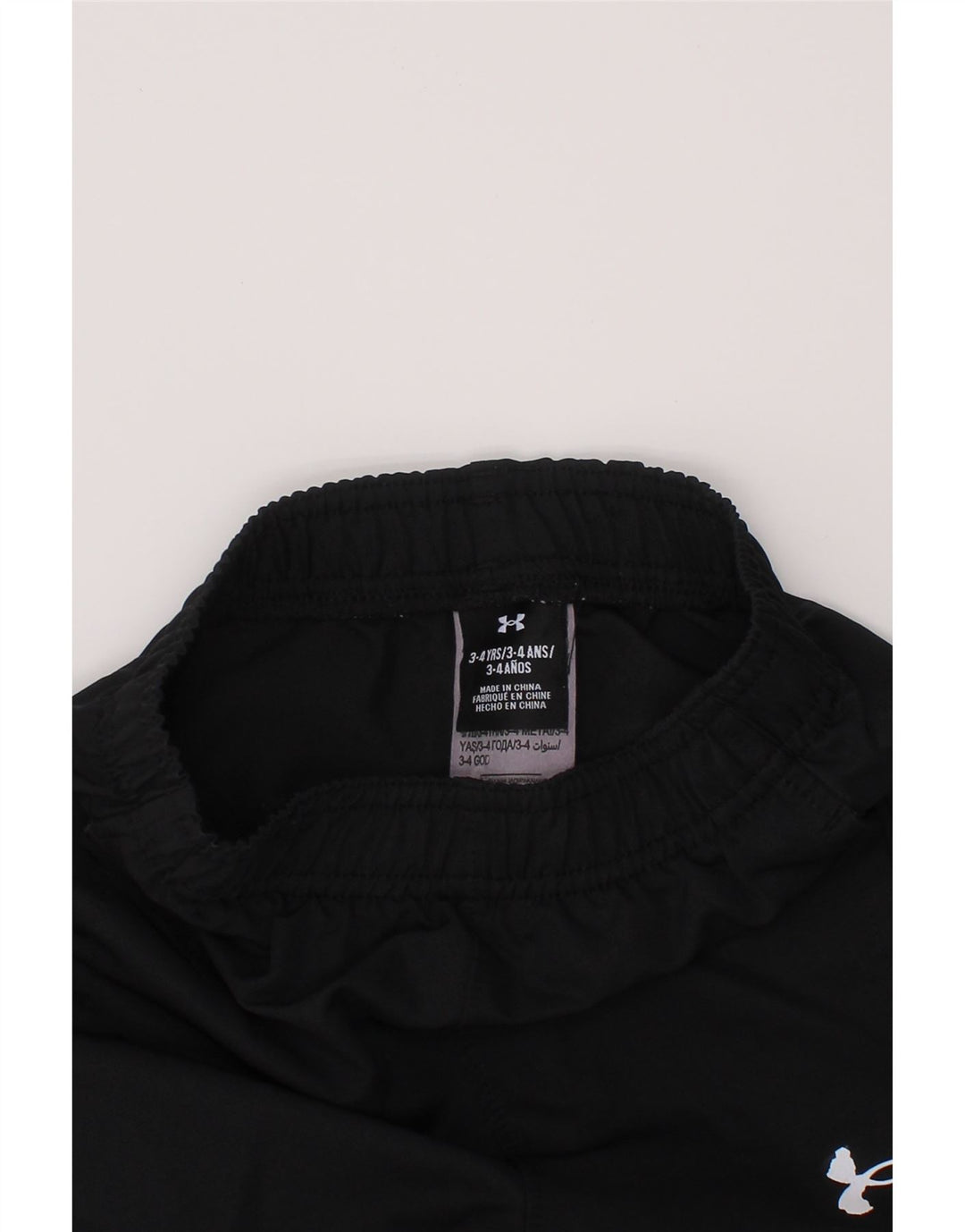 UNDER ARMOUR Pantalones de chándal con estampado gráfico para niños 3-4 años Negro