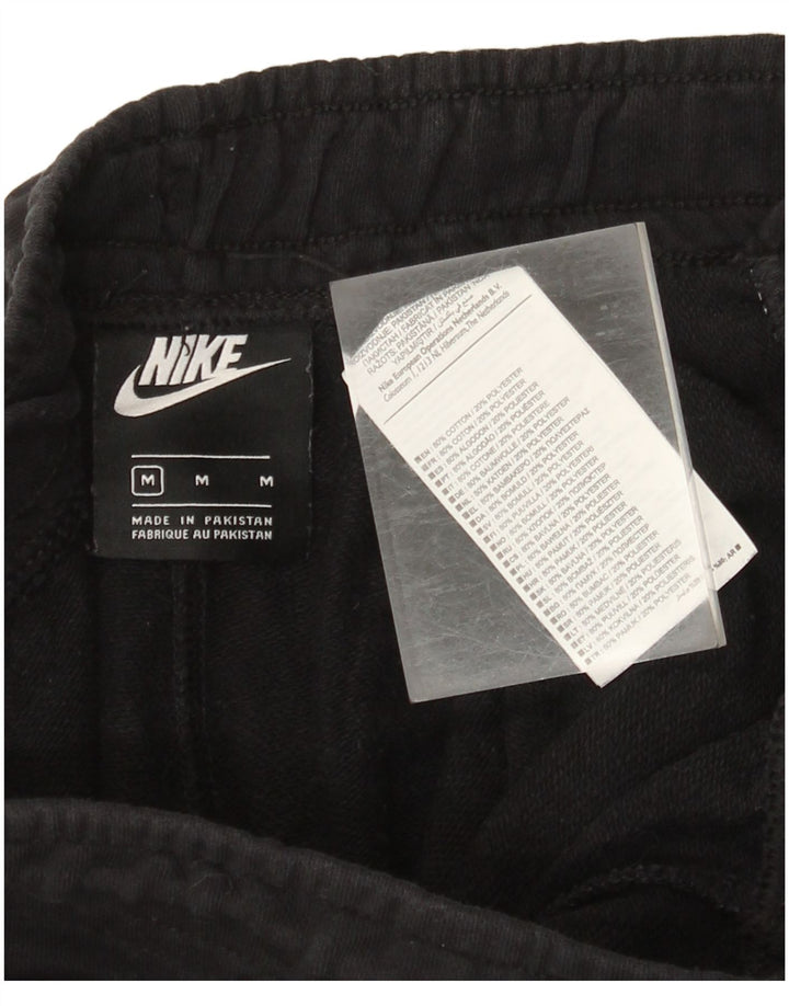 Nike - Pantalones de chándal para mujer, talla 40, talla mediana, color negro