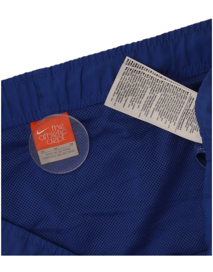 Pantalones cortos deportivos con estampado gráfico de poliéster en color azul medio para hombre Nike