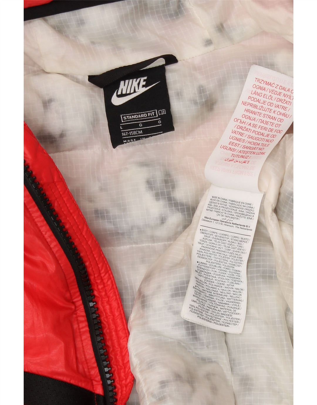 NIKE Chaqueta acolchada de ajuste estándar para niños de 13 a 14 años, talla grande, color rojo