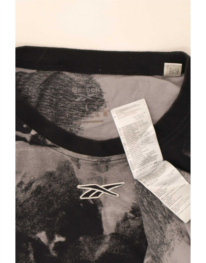 Reebok Camiseta con estampado abstracto para hombre, talla grande, algodón negro