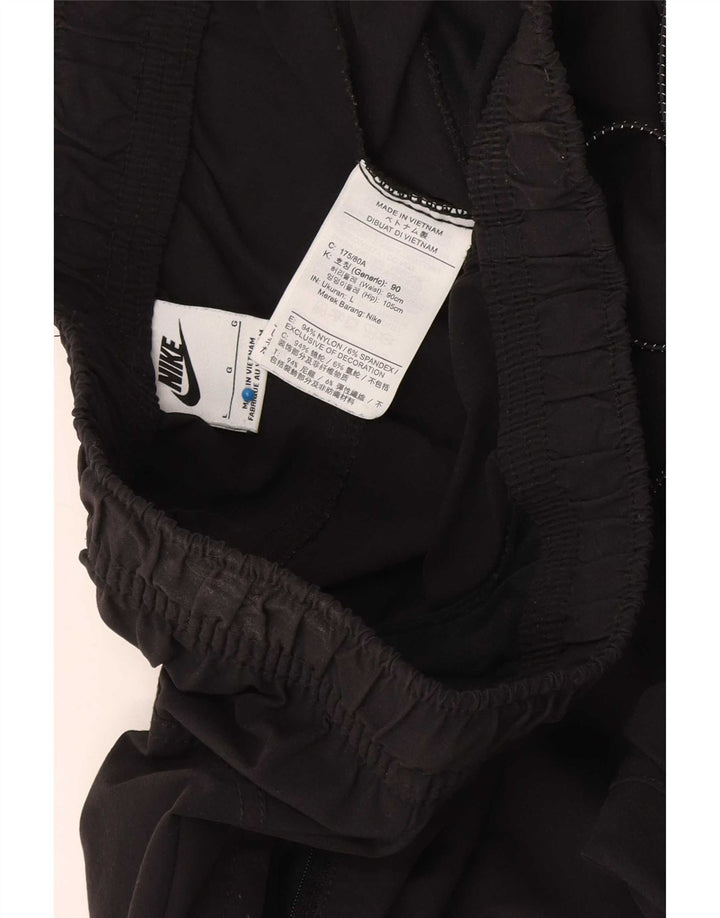 Nike Pantalones de chándal con gráfico Cargo para Hombre, Talla Grande, de Nailon Negro