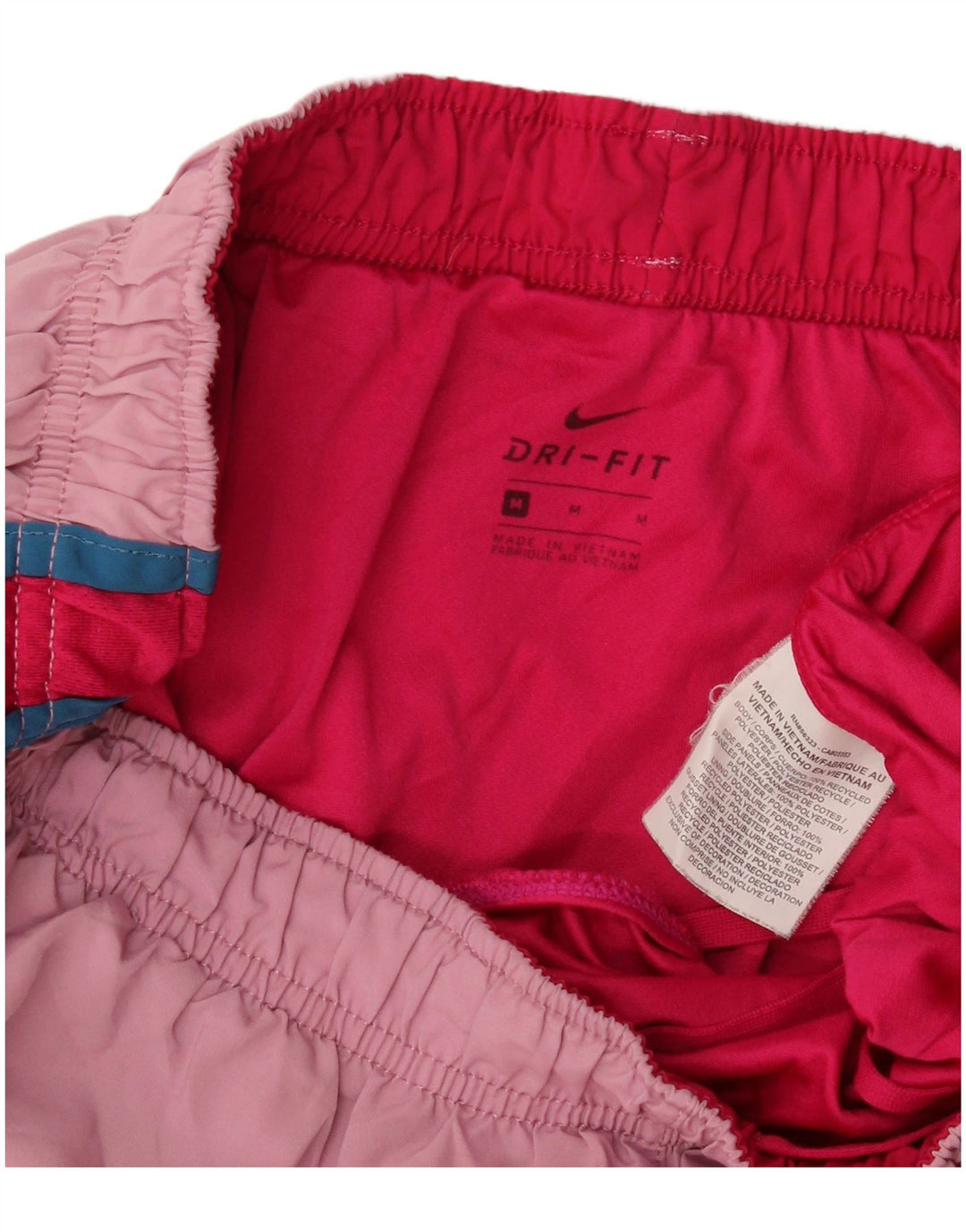 Nike - Pantalones cortos deportivos Dri Fit para mujer, talla 40, poliéster color block, color rosa medio