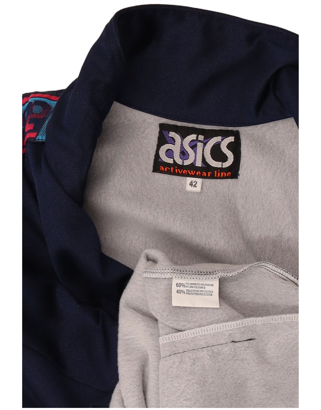 Asics Mujer Graphic Chándal Top Chaqueta IT 42 Medio Azul Marino Poliamida